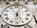 View of the old clock at the top of the city tower. Royalty Free Stock Photo