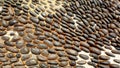 View of old cobble paving road for background. Closeup of a road with pebbles Royalty Free Stock Photo