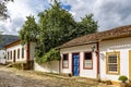 View of old colorful colonial houses on a cobbled street