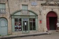 View of an old commercial building with photographe on top of the entrance door Royalty Free Stock Photo