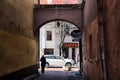 View of the old courtyard from the dark corridor Royalty Free Stock Photo