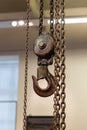 View of an old crane and metal chain