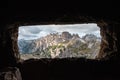 View through an old embrasure in an alpine fortress of the World War I, marking the former Austro-Italian frontier in the Dolomite