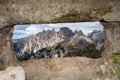 View through an old embrasure in an alpine fortress of the World War I, marking the former Austro-Italian frontier in the Dolomite