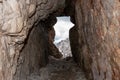 View through an old embrasure in an alpine fortress of the World War I, marking the former Austro-Italian frontier in the Dolomite