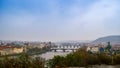 A view of old famous bridges, Prague old town and Vltava river from popular view point in the Letna park Letenske sady Royalty Free Stock Photo