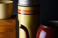 VINTAGE THERMOS FLASK WITH PLASTIC CUP AND BROWN ENAMEL KETTLE