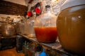 View of old fashioned wine cellar with glass storage for wine during fermentation process Royalty Free Stock Photo