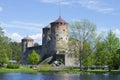 View of the old fortress Olafsborg (Olavinlinna), sunny day. Savonlinna, Finland