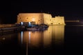 View of old harbour of Heraklion with Venetian Koules Fortress at the night. Crete, Greece. Heraklion by night. Koule fort at Irak