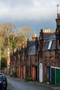 View on old houses in Dean village in New Town part of Edinburgh city, capital of Scotland, in sunny winter day Royalty Free Stock Photo