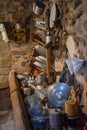 View of old kitchenware in the stone interior of a Catalan farmhouse