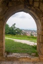 view of old kutaisi through the bell tower arch Royalty Free Stock Photo