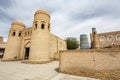 View at an old madrasa and Kalta Minor minaret in the old town of Khiva, Uzbekistan