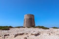 View of the old observation tower Torre De Ses Portes on the coast of the Ibiza island Royalty Free Stock Photo