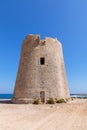 View of the old observation tower Torre De Ses Portes on the coast of the Ibiza island Royalty Free Stock Photo