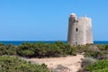 View of the old observation tower Torre De Ses Portes on the coast of the Ibiza island Royalty Free Stock Photo