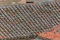 View of old orange tiles roof, used in the roofs of traditional architecture buildings, orange clay half-brim tile