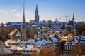 View of old part of city of Bern, Church of Nydeggkirche and Spire of Bernese Cathedral. Royalty Free Stock Photo