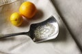 VINTAGE SUGAR SPOON WITH TWO SMALL YELLOW FRUIT
