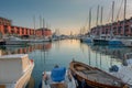 View of the old port of Genoa at sunset with Lanterna lighthouse, Italy. Royalty Free Stock Photo
