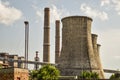 View of old power plant with big concrete furnaces . Fallen chemical communist industry