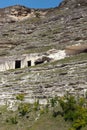 View of an old quarry, cave hand cut, made in a layered rocky hill