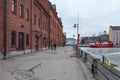 View of old red brick buildings on the waterfront, Helsinki, Finland. Royalty Free Stock Photo