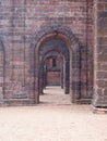 View of the old stone arches of the chapel going into the distance. Architecture of old buildings Royalty Free Stock Photo