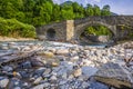 View of old stone bridge over river Royalty Free Stock Photo