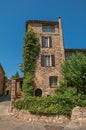 View of old stone houses in alley under blue sky at Les Arcs-sur-Argens Royalty Free Stock Photo