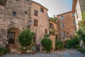 View of old stone houses in alley under shadow at Les Arcs-sur-Argens Royalty Free Stock Photo