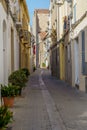 View of old street in Dalt la Vila, building with colored facade, historic center of Badalona, province of Barcelona, Spain Royalty Free Stock Photo