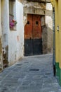 View of old street in Dalt la Vila, building with colored facade, historic center of Badalona, province of Barcelona, Spain Royalty Free Stock Photo