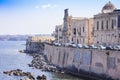 View of old street, facades of ancient buildings in Ortygia Ortigia Island, Syracuse, Sicily, Italy, traditional architecture Royalty Free Stock Photo