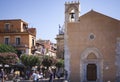 View of old street, facades of ancient buildings in Taormina, Sicily, Italy, traditional architecture
