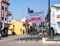 View of old street with many pigeons in Melaka, Malaysia