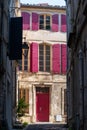 View on old streets and houses in ancient french town Arles, touristic destination with Roman ruines, Bouches-du-Rhone, France Royalty Free Stock Photo