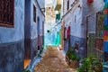View of the old streets of Tetouan Medina quarter in Northern Morocco. A medina is typically walled, with many narrow and maze- Royalty Free Stock Photo