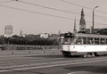 View of old town bell tower of Riga Cathedral and old tram on the Stone bridge, Riga, Latvia