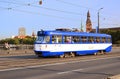 View of old town bell tower of Riga Cathedral and old tram on the Stone bridge, Riga, Latvia