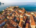 View of old town Budva from the top: Ancient walls and tiled roo