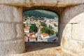 View of the old town of Dubrovnik through an opening in the wall of the fortress in Croatia