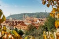 View of old town with hictorical buildings,red roofs,churches,Petrin hill in Prague,Czechia.Prague panorama.Beautiful sunny