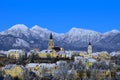 View of old town Kranj and snow covered mountain peak of Grintovec and Skuta Royalty Free Stock Photo