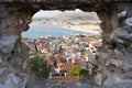 View of the old town of Nafplion through the window-hole in the fortress wall