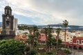 View on the old town of Puerto de la Cruz and the church of Nuestra Senora de la Pena de Francia.