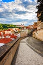 View of old town street and buildings, Strahov Monastery in the background at sunset, Prague, Czech Republic Royalty Free Stock Photo