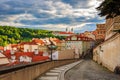 View of old town street and buildings, Strahov Monastery in the background at sunset, Prague, Czech Republic Royalty Free Stock Photo