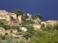 View of old traditional French small Provencal village Bonnieux in sunny day with clear blue sky